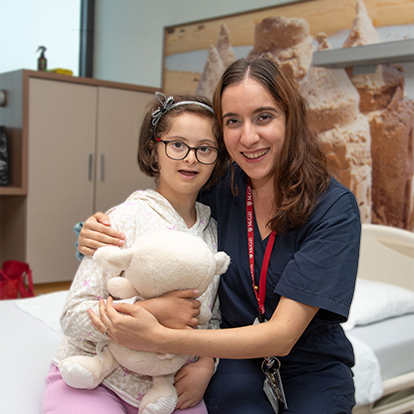 Nurse hugging patient