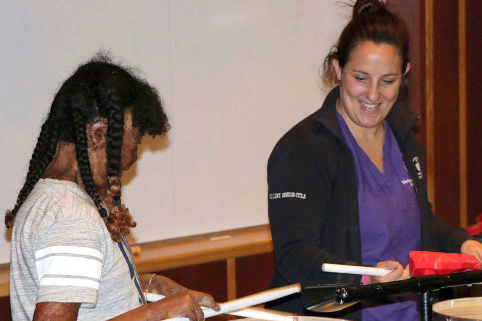 patient doing drum therapy