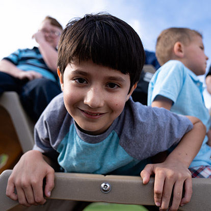 boy outside smiling