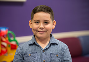 male patient with a smile on his face