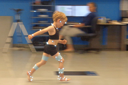 young male patient in motion analysis center