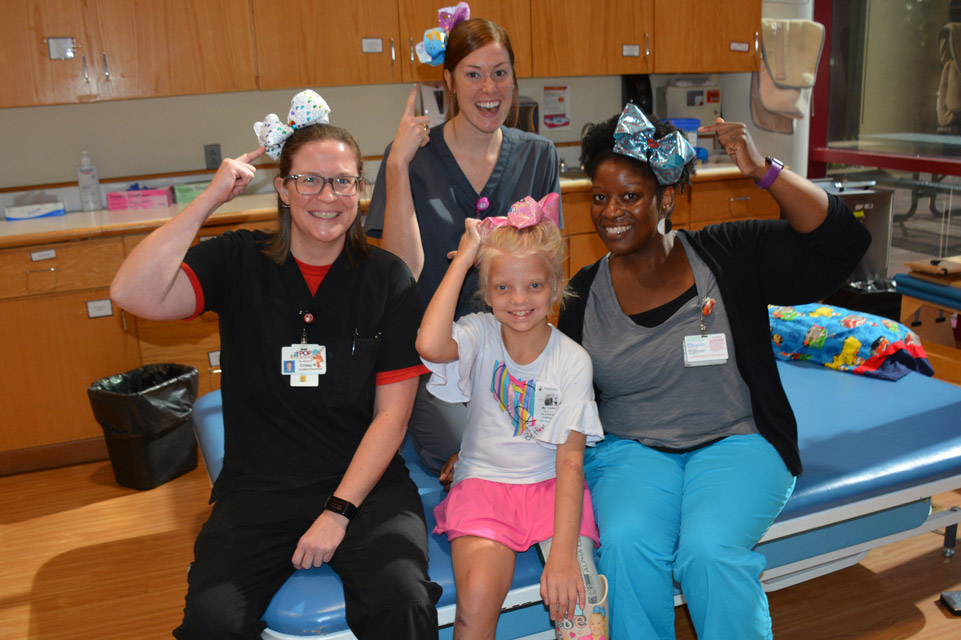 patient and three staff members