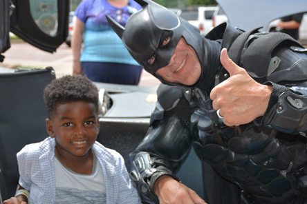 patient with man in Batman costume