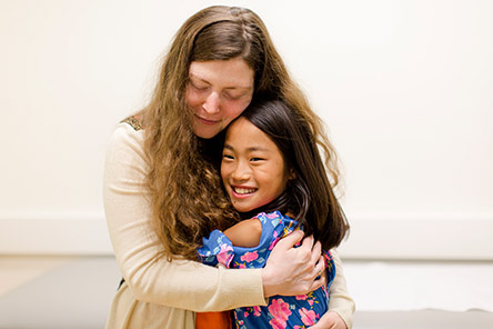 nurse hugs patient