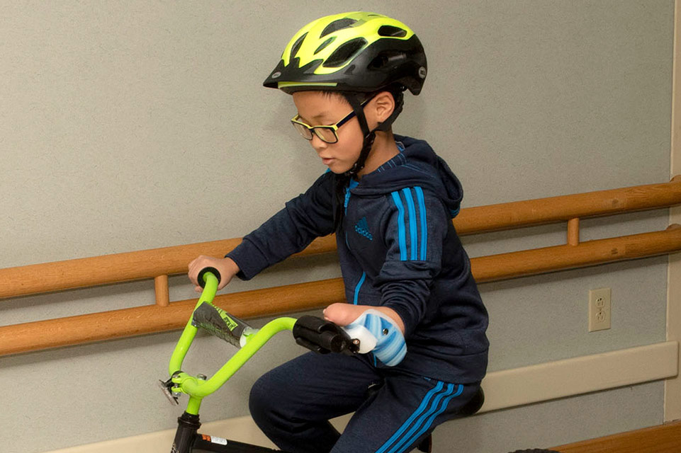 patient riding bicycle