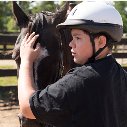 patient with horse at camp