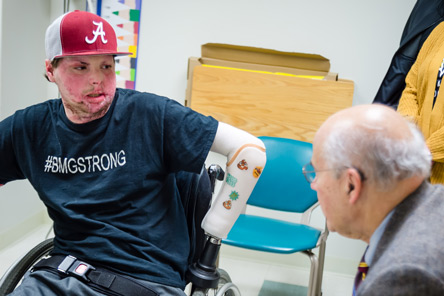 burn patient talking with physician