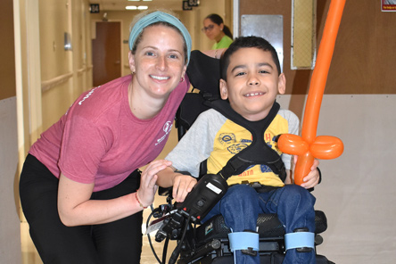 nurse with patient in wheelchair