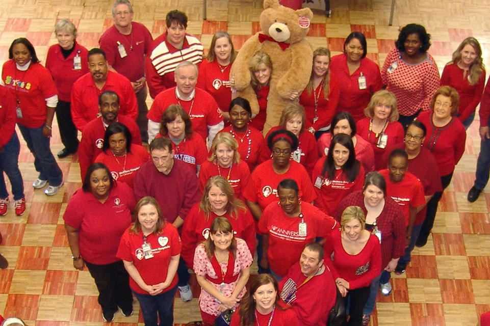 large group of staff members