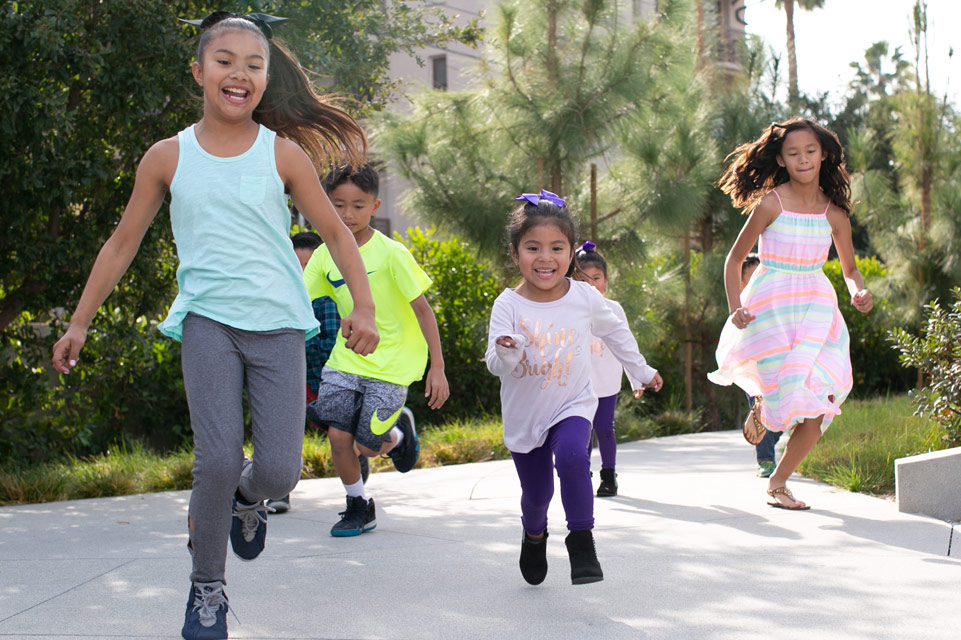 five patients joyfully running