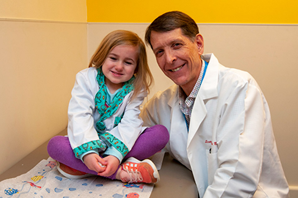 patient on exam table and physician