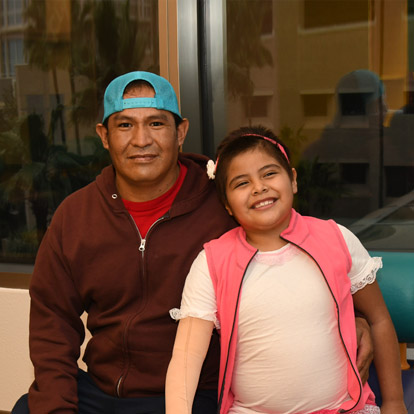 female patient with her father