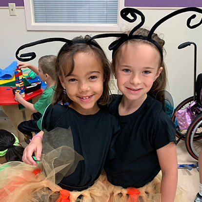 two female patients wearing costumes