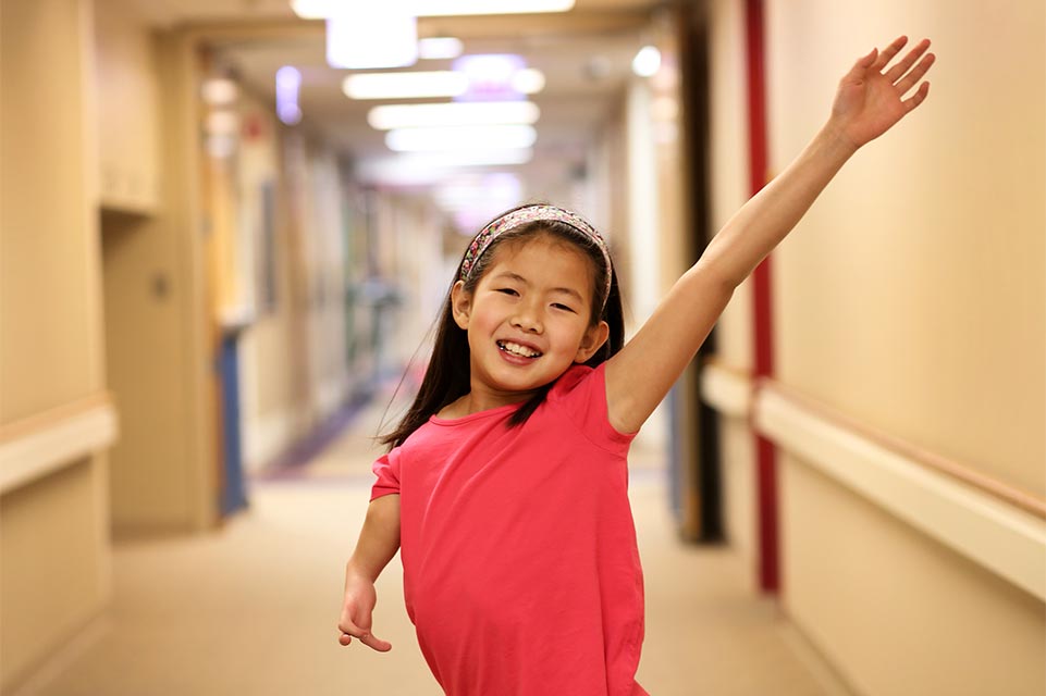 female patient in hallway