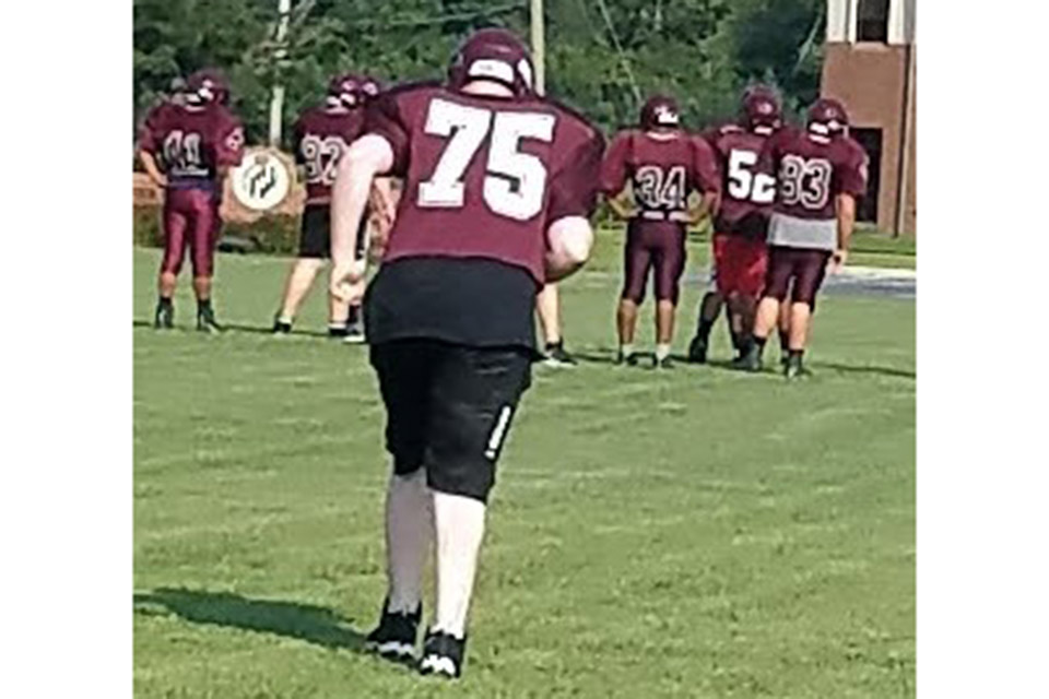 James playing football