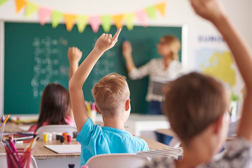 students and teacher in classroom