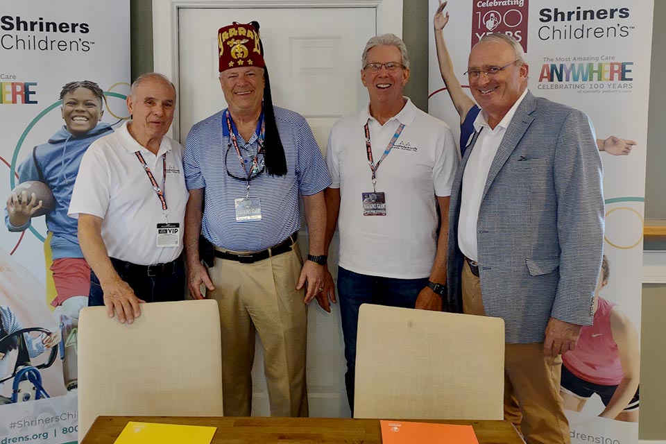 Stuart Sullivan, Shriner, two partner representatives