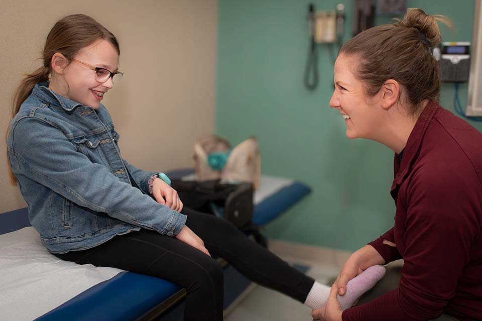 female nurse laughing with female provider