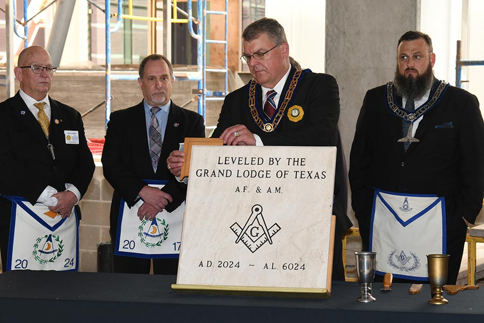 four Shriners conducting cornerstone ceremony