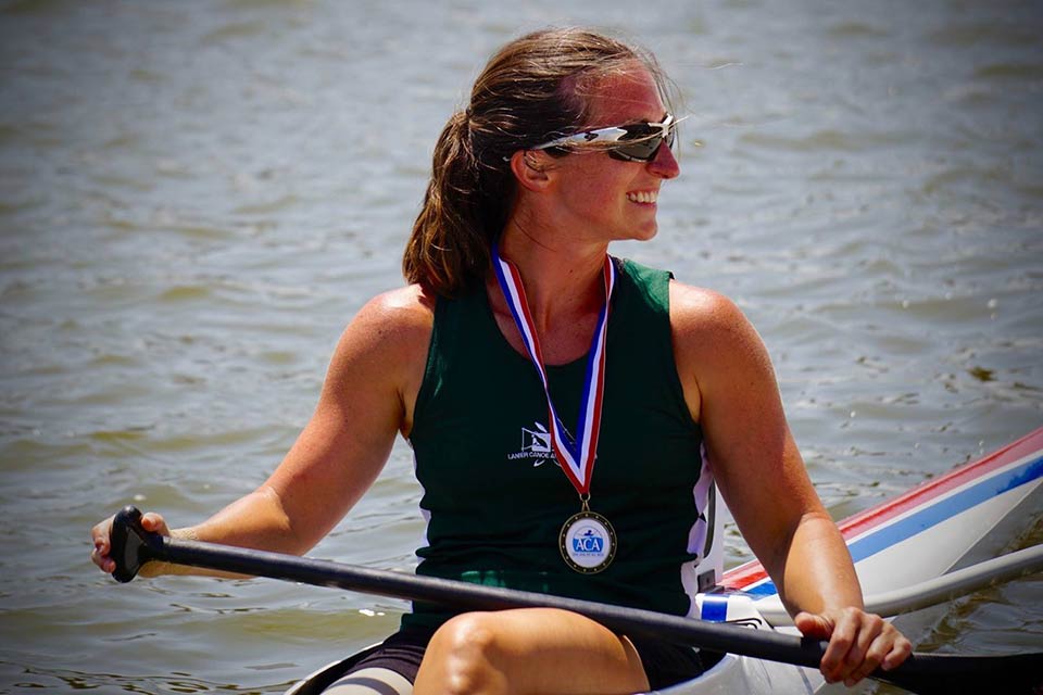 Jillian in kayak on water