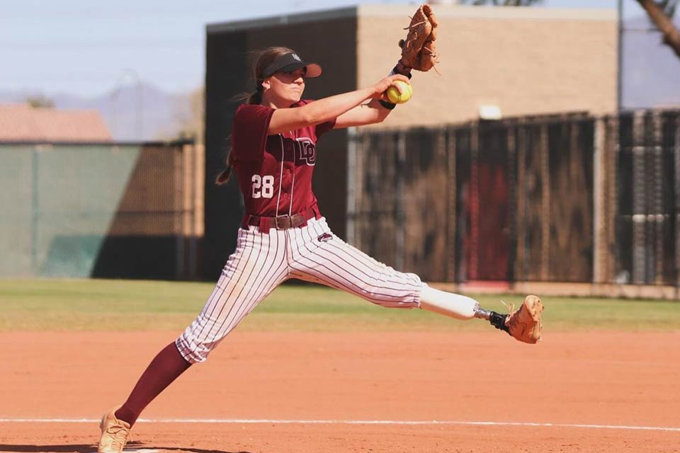 limb length discrepancy patient Ali pitching softball, wearing prosthetic leg