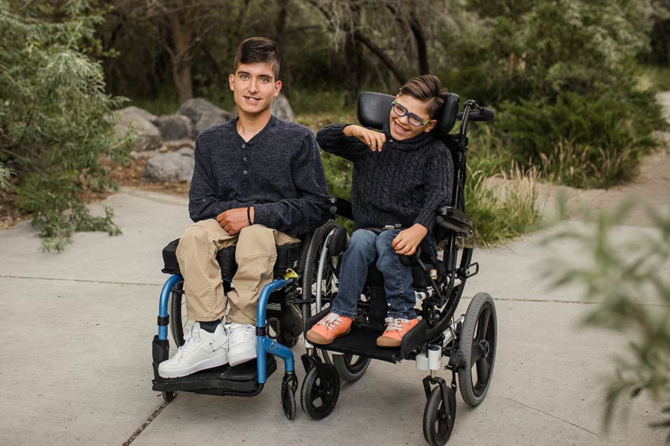 Miles and Jonah, spina bifida and cerebral patients, in wheelchairs