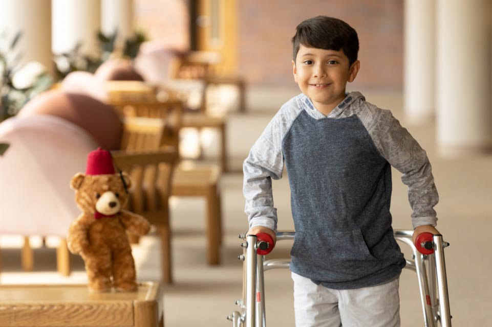 male rehabilitation patient using walker