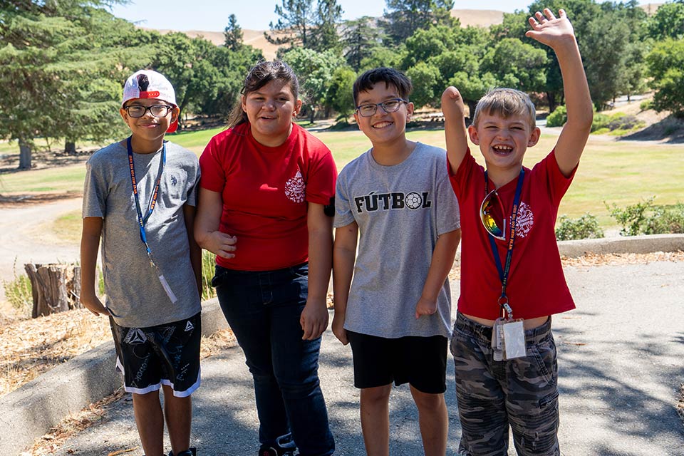 four campers, three boys and one girl