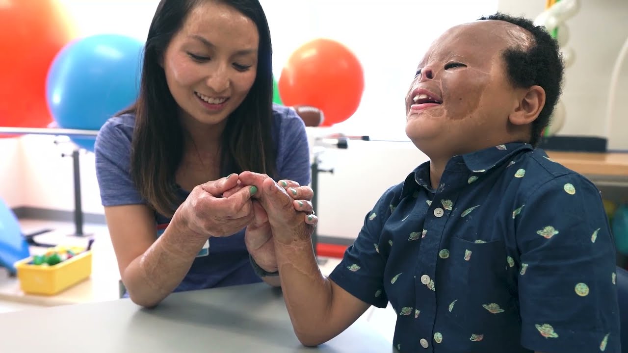 male burn patient with provider