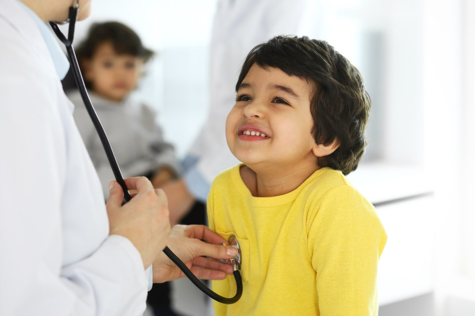 physician examines male patient