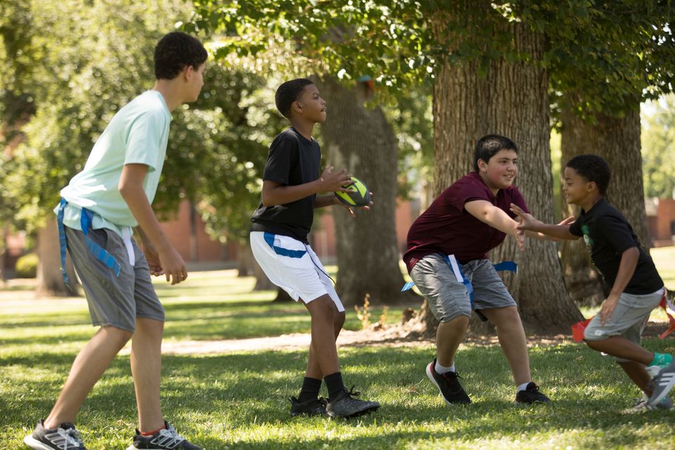 boys playing flag football