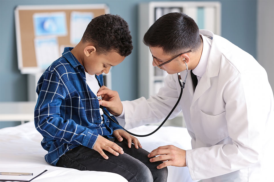 physician examines male patient