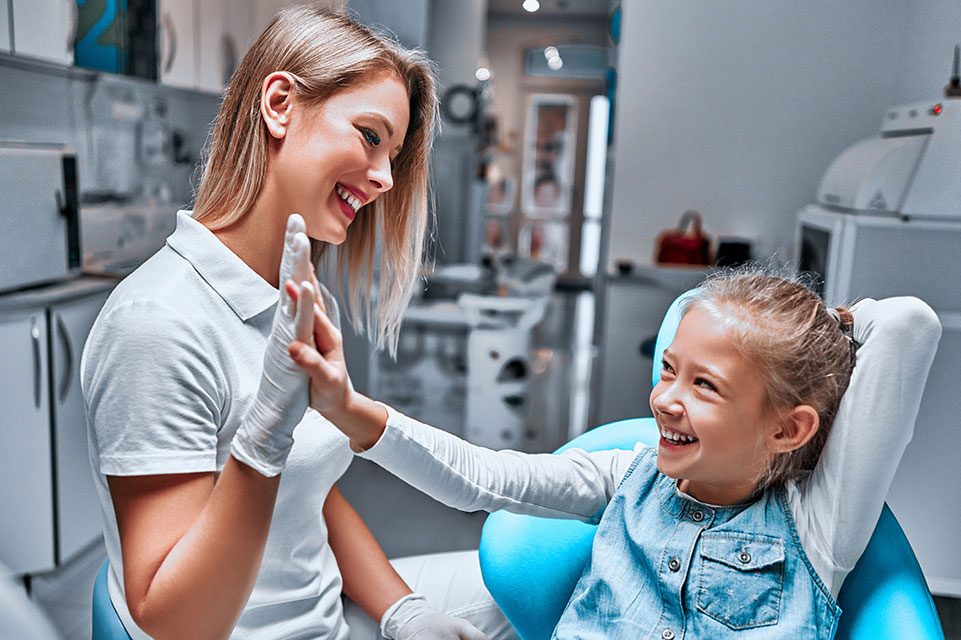 nurse and patient share a high five