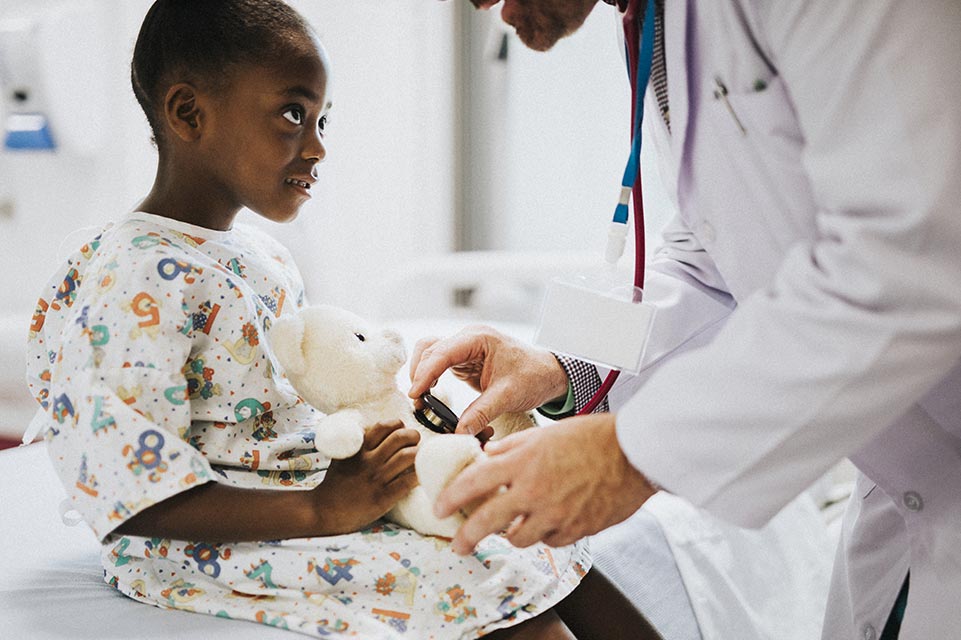 physician examines male patient