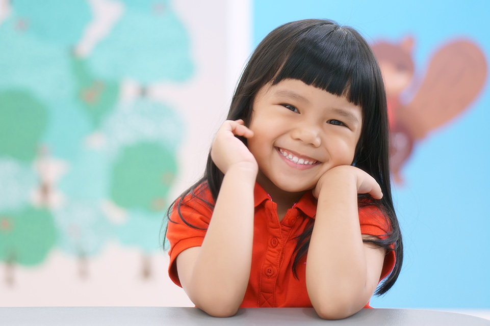 Paciente femenina sonriendo