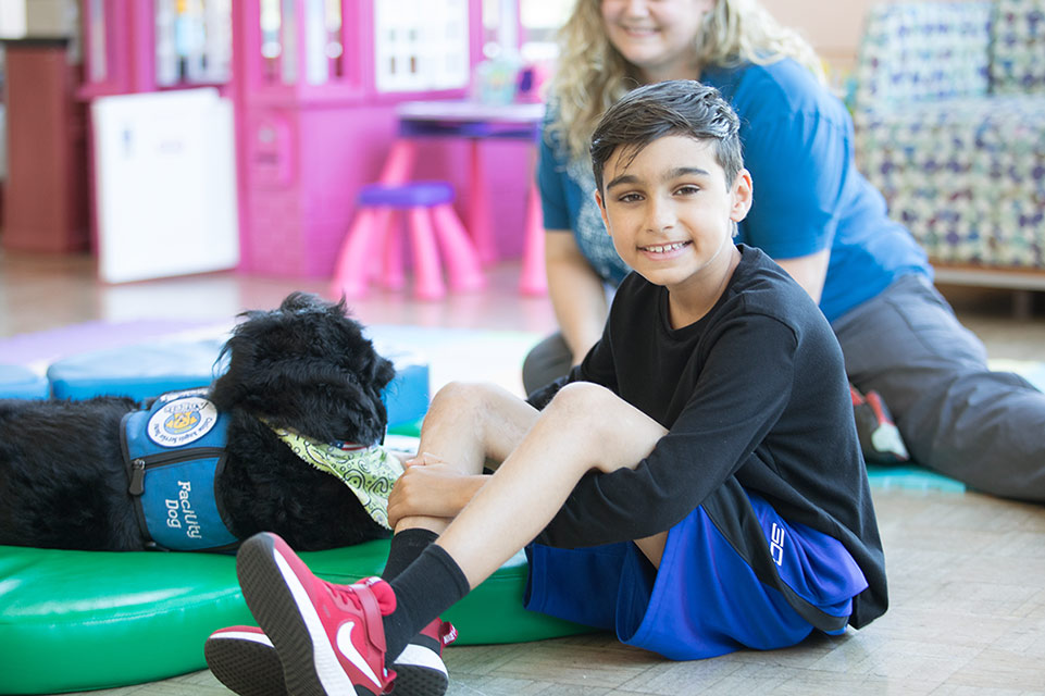 male patient with pet therapy dog