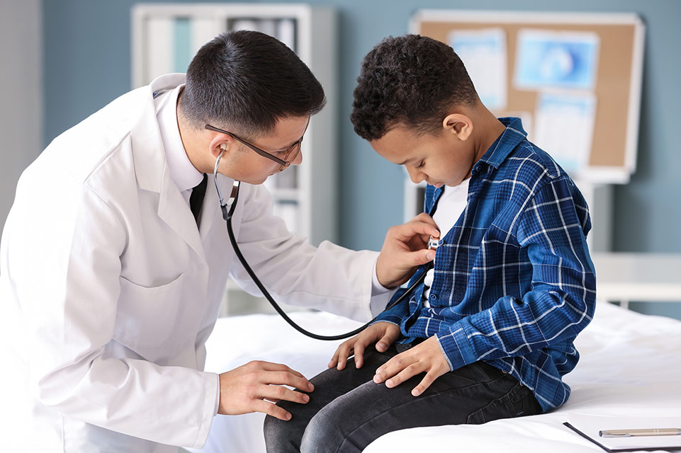 physician examines male patient