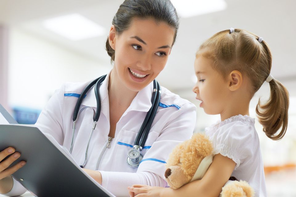 physician speaking with female patient