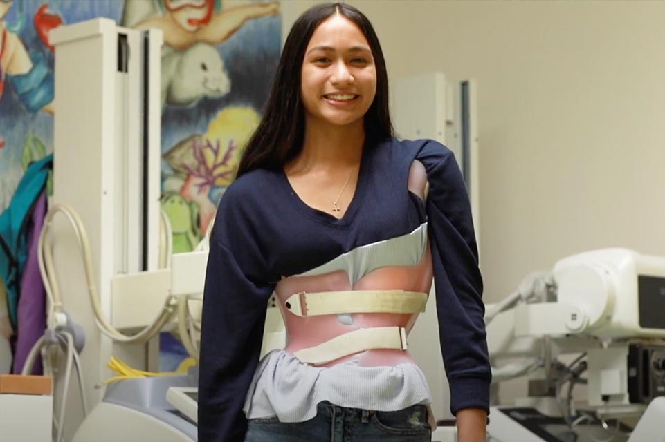 Patient wearing back brace