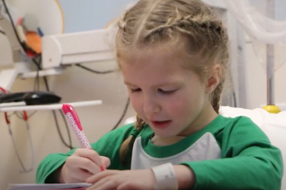 Girl with drawing with pen